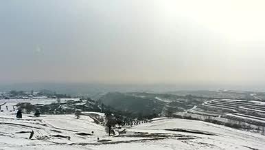 4K高清黄土高原下雪风景航拍视频的预览图